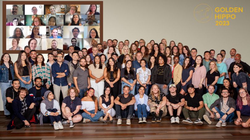 A group photo of employees at Golden Hippo tech company. 